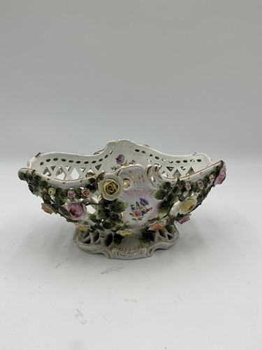 Lot 59 - A Continental porcelain piereced basket with...