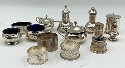 Lot 255A - A collection of silver cruets and napkin rings