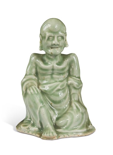 Lot 40 - A Chinese celadon figure of a Daoist Immortal, 19th century