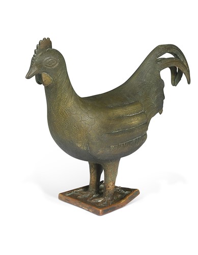 Lot 699 - An African Benin cast bronze gilt figure of a ceremonial cockerel (Okukor), 18/19th century