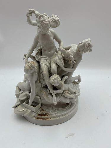 Lot 5 - A continental porcelain white glazed figure group of La Toilette de Vénus, 19th century