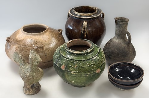 Lot 3 - A Chinese green glazed pottery jar, Han Dynasty