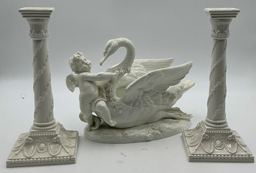 Lot 4 - A pair of Royal Worcester white glazed moulded...