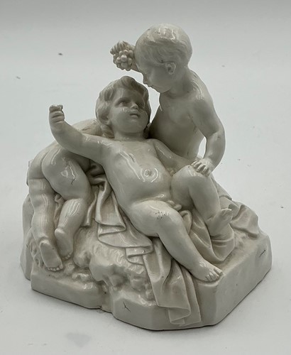 Lot 1 - A 19th century Derby white glazed figure group...