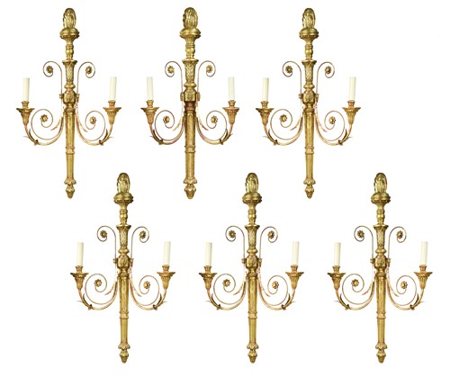 Lot 656 - A set of six Neo-Classical style giltwood twin branch wall lights, modern