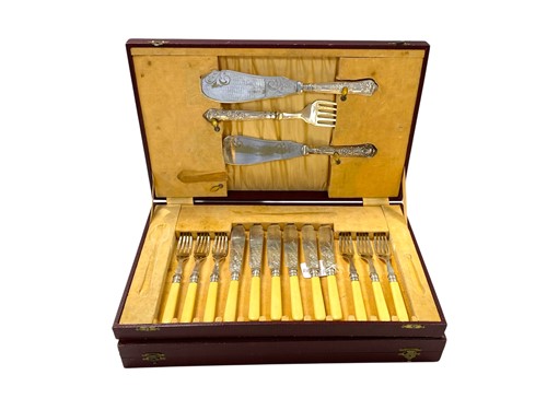 Lot 250 - Three cased sets of cutlery, two with filled...