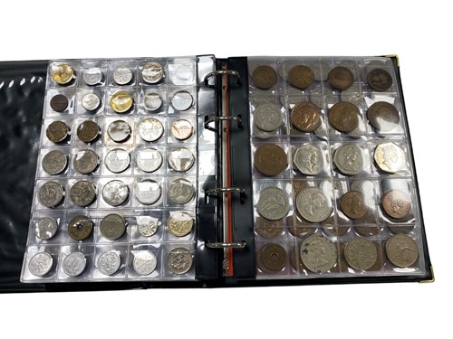 Lot 276 - An album containing a collection of British...