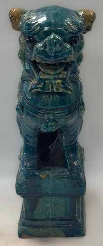 Lot 22 - A Chinese Guangdong pottery dog of fo, late Qing Dynasty, 19th century