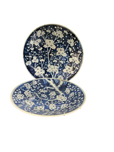 Lot 10 - A pair of Chinese blue and white prunus...
