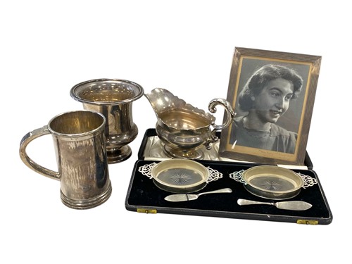 Lot 248 - A silver sauce boat, photograph frame, a pair...