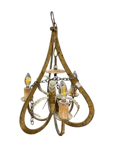 Lot 570 - A three-arm cast metal scrolling light 56cm high