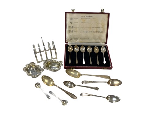 Lot 255 - A small collection of silverware including...