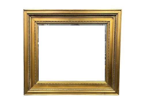 Lot 565 - A gilt framed mirror with egg and dart frame...