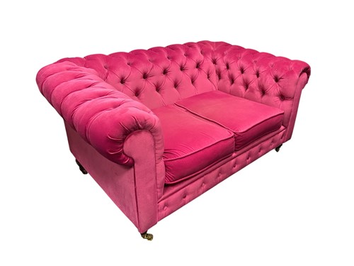 Lot 563 - A Chesterfield buttoned back two seat sofa,...