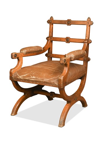 Lot 758 - In the manner of Pugin, a reformed Gothic oak library chair, circa 1880