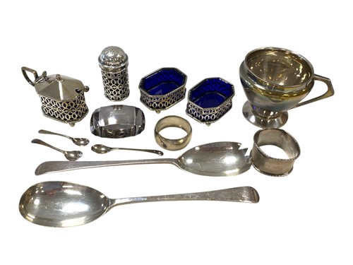 Lot 227 - A pierced silver four-piece cruet, together...