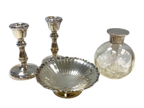 Lot 228 - A near pair of silver dwarf candlesticks,...