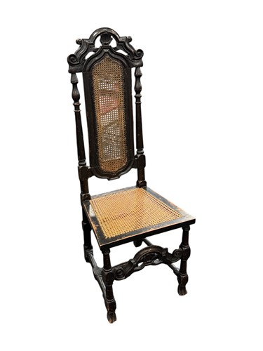 Lot 556 - A Carolean side chair with caned back and seat