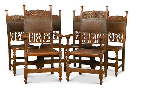 Lot 367 - A set of eight Arts & Crafts oak dining chairs