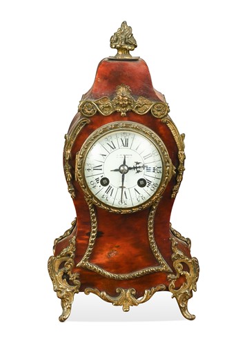Lot 614 - A French tortoiseshell mantel clock, late 19th century