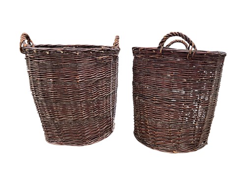 Lot 519 - Two large wicker baskets with handles, 62cm...