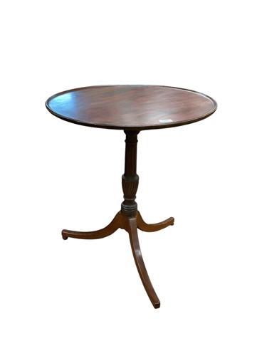 Lot 518 - A circular topped tripod occasional table with...