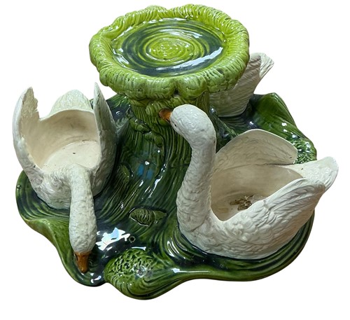Lot 63 - A Bretby Art Pottery centrepiece with three...