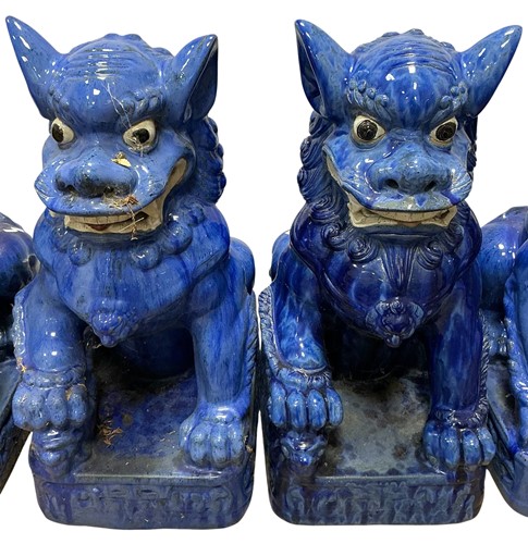 Lot 202 - A large pair of blue glazed Chinese dogs of Fo...