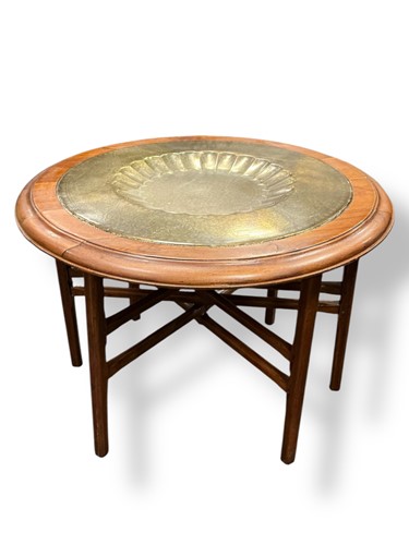 Lot 479 - A Benares brass table on stand with scalloped...