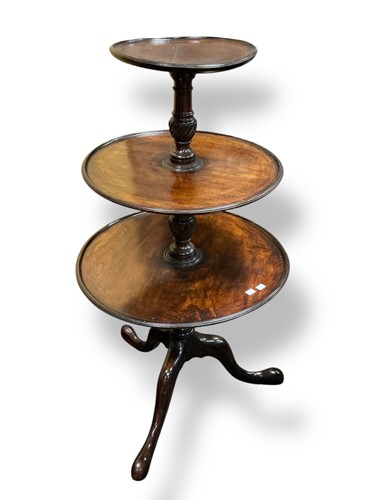 Lot 480 - A George III style mahogany three-tier dumb...
