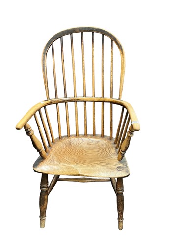 Lot 438 - A 19th century stick back Windsor...
