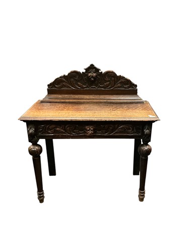 Lot 430 - A 17th century style continental oak sideboard...