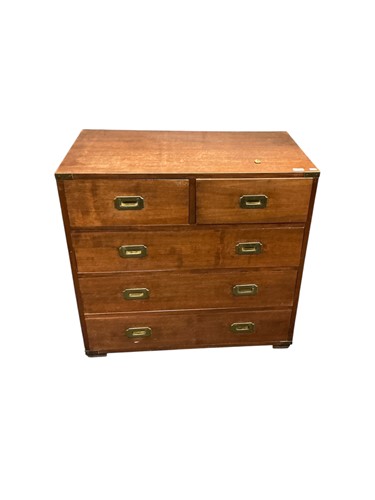 Lot 434 - A pair of teak campaign style chest of drawers...