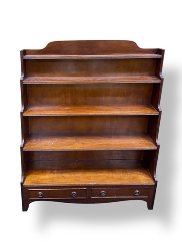 Lot 470 - A Regency style mahogany waterfall bookcase...