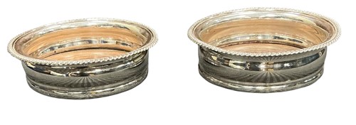 Lot 241 - A pair of silver plated wine coasters 15cm D