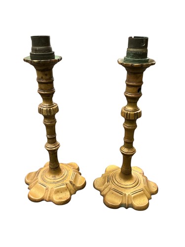 Lot 18 - A pair of bronze candlesticks, converted for...
