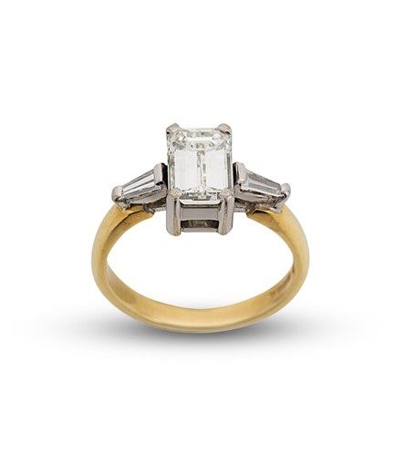 Lot A single stone diamond ring with diamond set shoulders