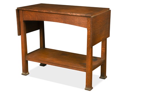 Lot 346 - An Arts & Crafts oak serving table, possibly Leonard Wyburd for Liberty & Co.