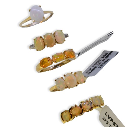 Lot 72 - Five 9ct gold opal Gemporia rings