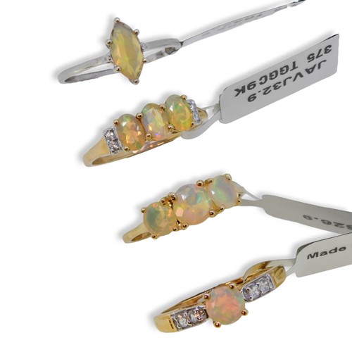 Lot 63 - Four 9ct gold opal Gemporia rings, together with a pair of ear studs
