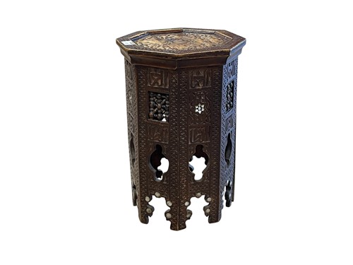 Lot 559 - A 20th century North African carved wood...