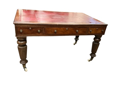 Lot 513 - A mahogany library table containing 19th...