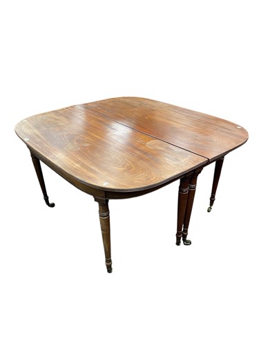 Lot 548 - A Regency mahogany D-end dining table, with...