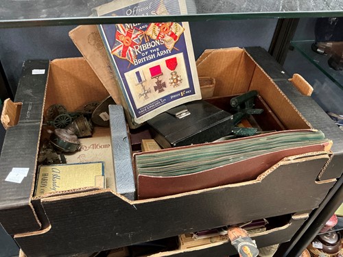 Lot 189 - A mixed assortment of old coins, military...