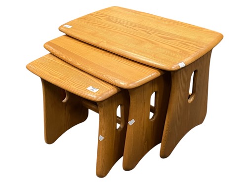 Lot 570 - Ercol nested tables, a set of three coffee...