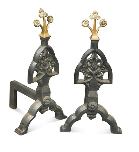 Lot 323 - In the manner of A. W. N. Pugin, a pair of Gothic Revival cast iron and brass andirons