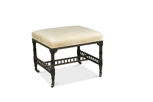 Lot 329 - An Aesthetic period ebonised stool by Rumney & Love, Liverpool