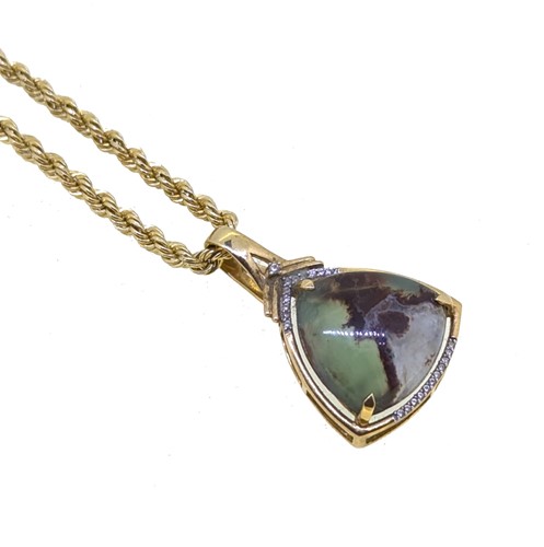 Lot 98 - A 9ct gold aquaprase pendant and chain