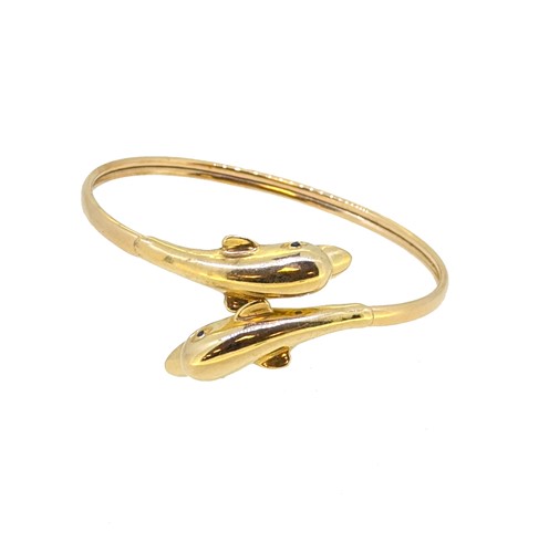 Lot 101 - A dolphin bangle