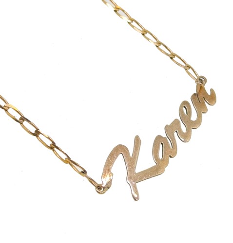 Lot 96 - A 9ct gold 'Karen' name plate necklace
